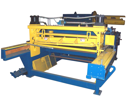 The powered 6 roll straightener section removes coil set and the flying shear assembly cuts the material to length.