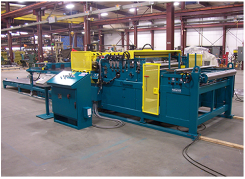 The powered straightener section removes coil set and the flying shear assembly cuts the material to length.