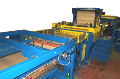 The powered 6 roll straightener section removes coil set and the flying shear assembly cuts the material to length.