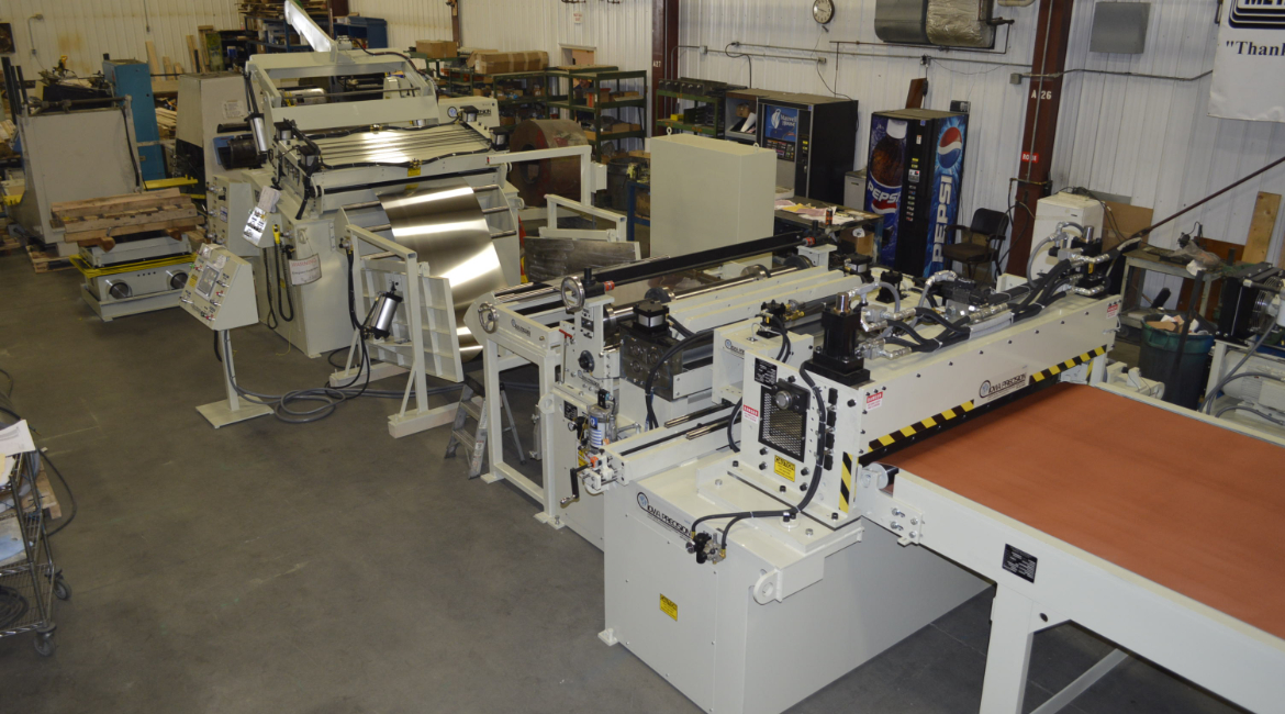 SLEAR, SLEAR-2, SLEAR-II, SLEER, Coil Processor, multi-blanking, multi-blanking system, mbl, slitting, slitter, slitter arbor, slitter blades, slitter blade access door, cut-to-length, CTL, stock reel, uncoiler, drop-in uncoiler, multi-coil uncoiler, coil reel, payoff reel, motorized uncoiler, powered uncoiler, coil car, coil loading car, coil loading & storage car, straightener, powered stock straightener, stock straightener, metal coil straightener, peeler table, peeler/threader table, peeler blade, hydraulic shear, hydraulic cutoff shear, cutoff, cutoff shear, notcher, notching system, notching dies, hydraulic notcher, hydraulic notching dies, touchscreen, touchscreen HMI, runout conveyor, belt conveyor conveyor, part conveyor