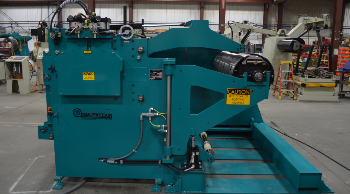 multi-blanking, multi-blanking system, mbl, slitting, coil-to-coil slitting, uncoiling and recoiling, recoiler, coiler, rewinder, tension stand, tension rolls, tension arm, separators, separator plates, tension recoiling, overarm separators, separator discs, separator plates, outboard support, outboard spindle support, outboard recoiler spindle support, swing-away, stabilizer support, outboard support